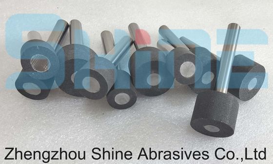 超硬質材料の加工のための陶磁製の粘着式磨き機